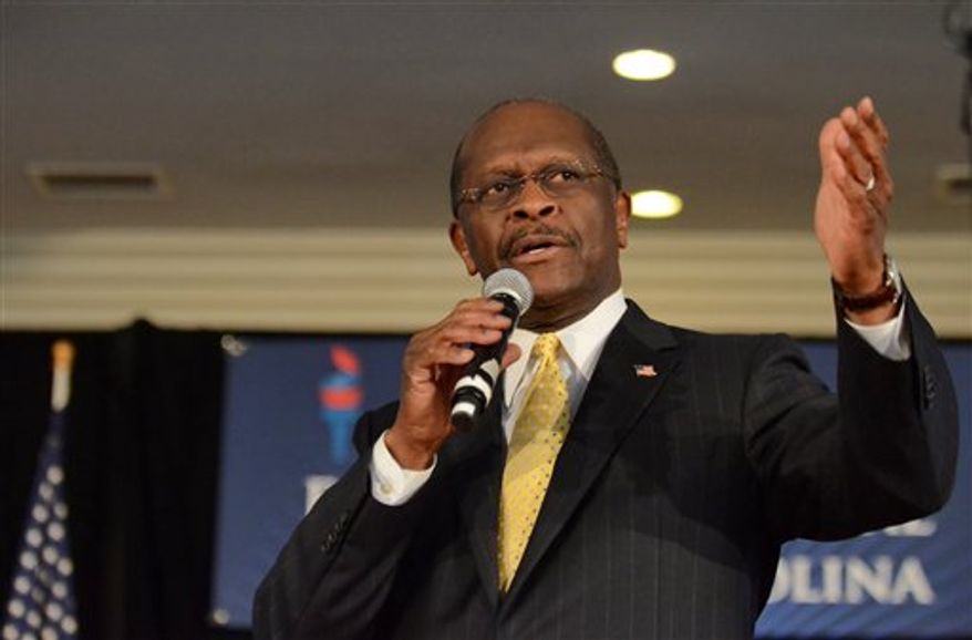 **FILE** Herman Cain speaks Dec. 2, 2011, to campaign supporters in Rock Hill, S.C. (Associated Press)
