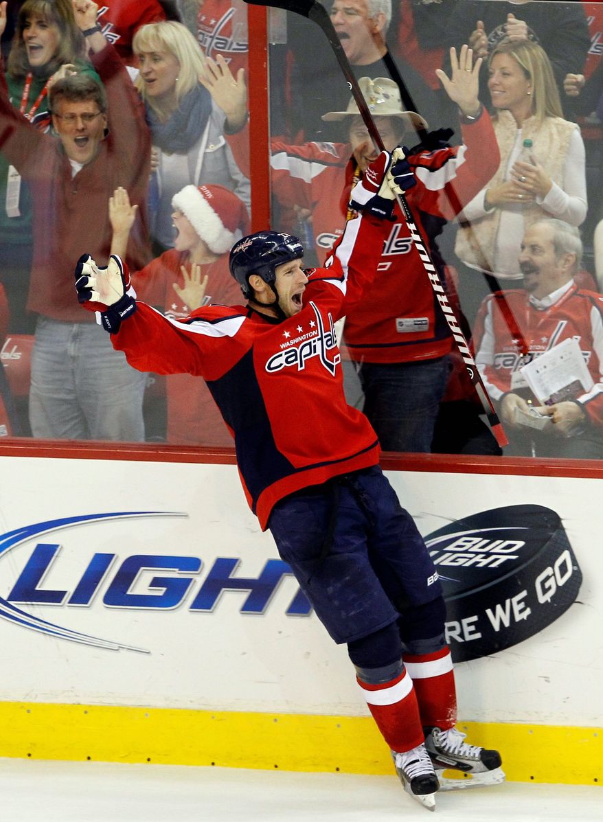 ASSOCIATED PRESS
Capitals center Brooks Laich celebrates his game-winning goal Saturday in Washington's 3-2 overtime win over Ottowa at Verizon Center. It was the first win since Dale Hunter took over as coach last week.