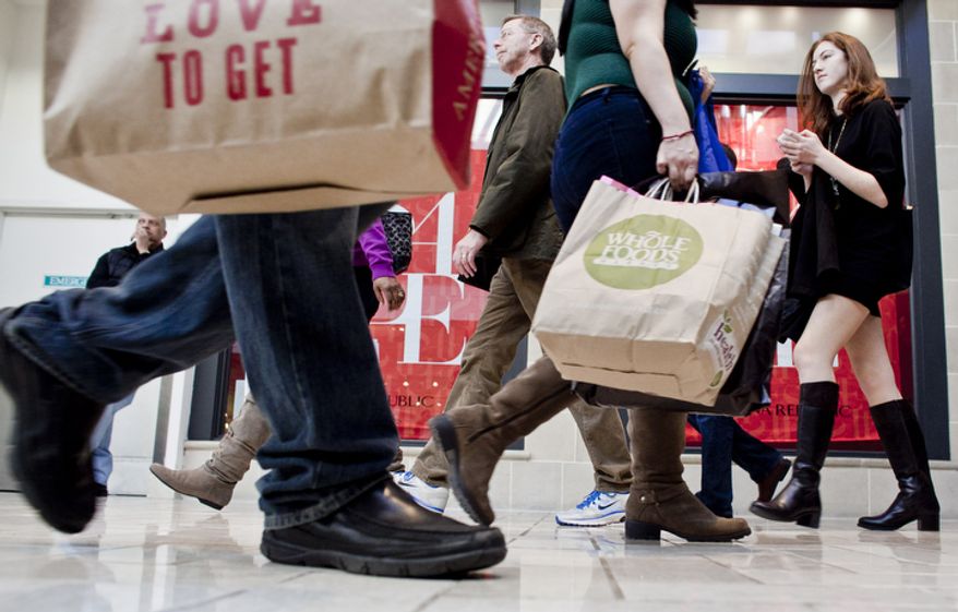 Shoppers crowd Tysons Corner Center in McLean on Monday, Dec. 26, 2011, for returns and after-Christmas sales. (The Washington Times)