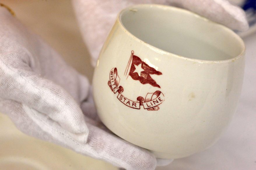 A piece of china used by third-class passengers of the Titanic is part of a collection that will be up for auction. (Associated Press)