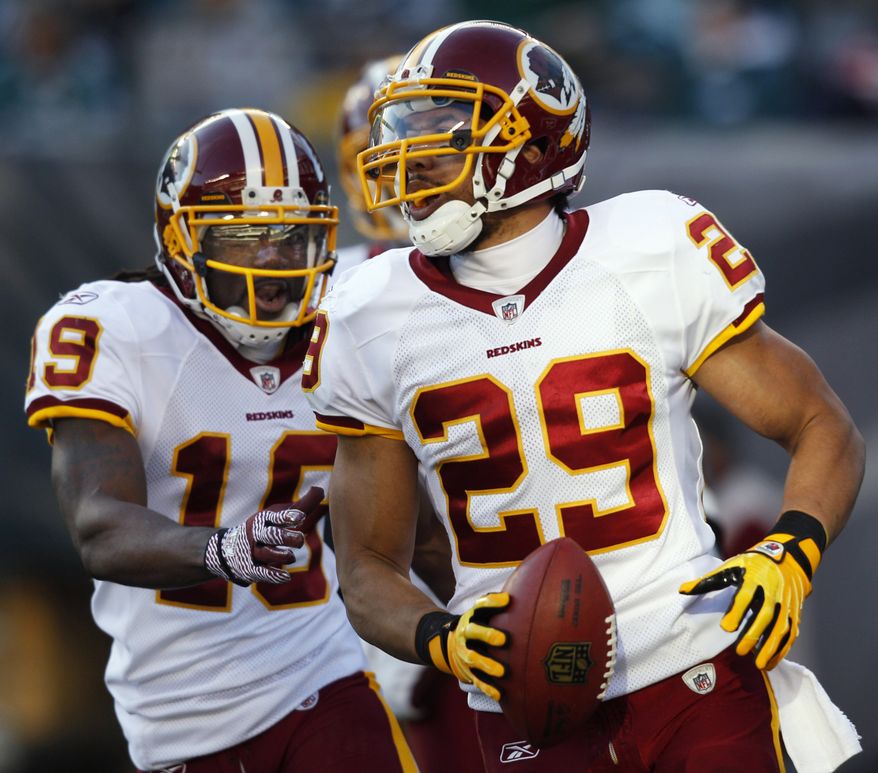 Washington Redskins' Donte' Stallworth (19) and Roy Helu (29) celebrate after Helu's touchdown during the second half against the Philadelphia Eagles, Sunday, Jan. 1, 2012, in Philadelphia. (AP Photo/Mel Evans)