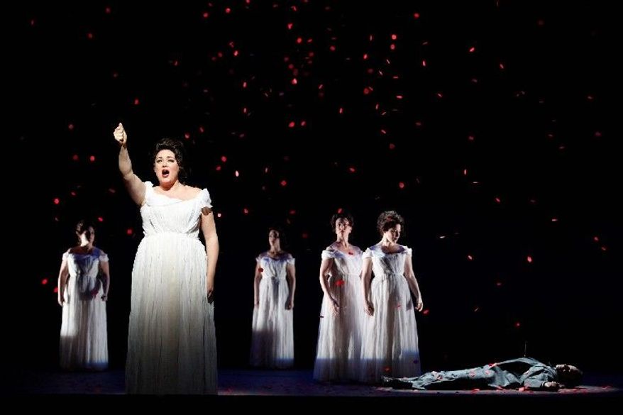 Kara Shay Thomson performs in Schoenberg's "Erwartung" during the final dress rehearsal in March of the New York City Opera production of "Monodramas." City Opera - which for decades has built daring new productions along with the careers of such stars as Placido Domingo, Renee Fleming and Beverly Sills - is now fighting for its life. A bitter contract dispute has led to a lockout of musicians and could be a possible "death knell" for one of New York's cultural treasures. (New York City Opera via Associated Press)