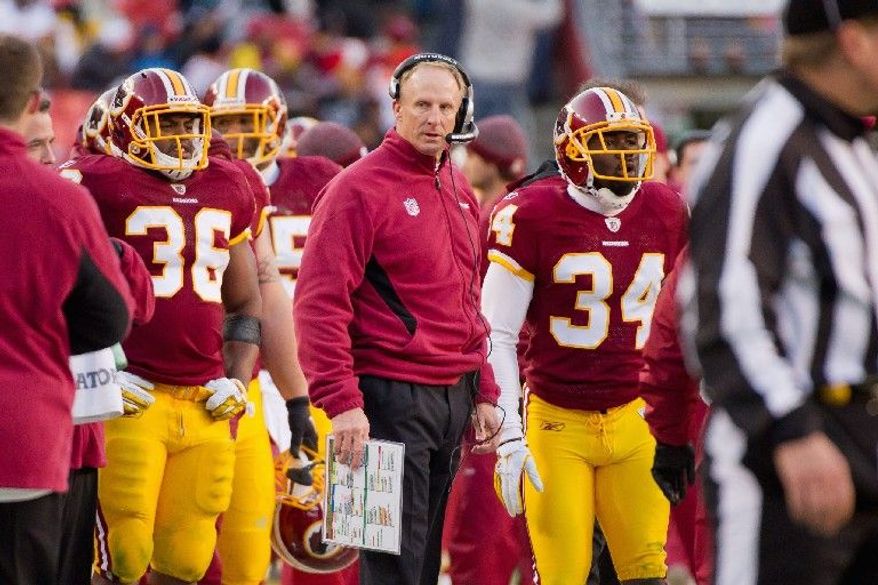Under Jim Haslett's guidance, Washington climbed from 30th in yards allowed per play in 2010 to 17th in 2011. (Andrew Harnik/The Washington Times)