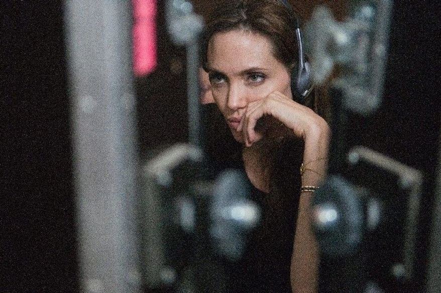 Miss Jolie wrote the screenplay and makes her debut as a director "In the Land of Blood and Honey." (Film District via Associated Press)