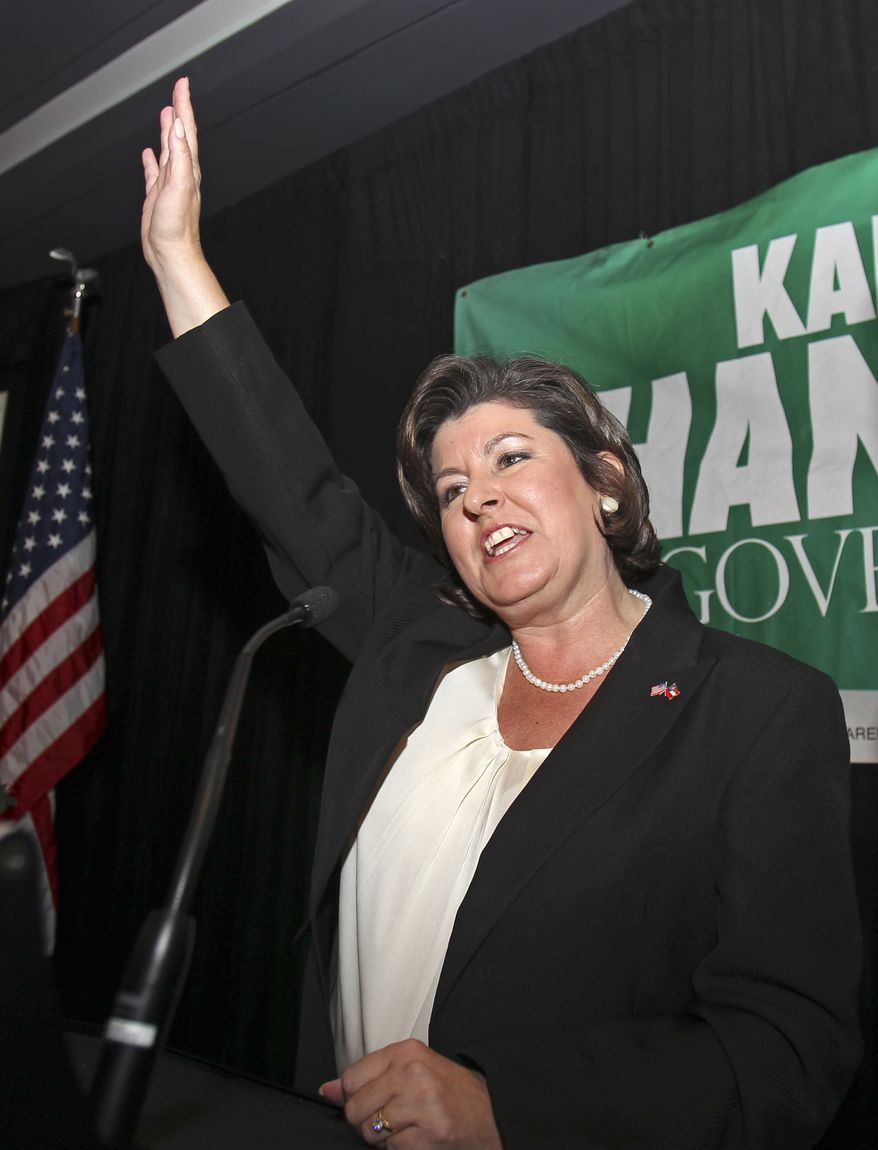 **FILE** Georgia gubernatorial candidate Karen Handel waves Aug. 10, 2010, to supporters during an election-night party in Atlanta in her runoff with former Congressman Nathan Deal for the Republican nomination. (Associated Press)
