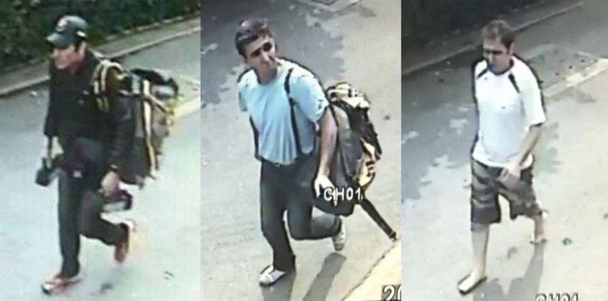 In this combination of images made from surveillance video on Tuesday, Feb. 14, 2012, three Iranian bomb-plot suspects, identified by police as (from left) Saeid Moradi, Mohammad Kharzei and Masoud Sedaghatzadeh, walk down the middle of a residential street in Bangkok after a blast at an explosives-filled house where the three were staying. (AP Photo/National Thai Police)