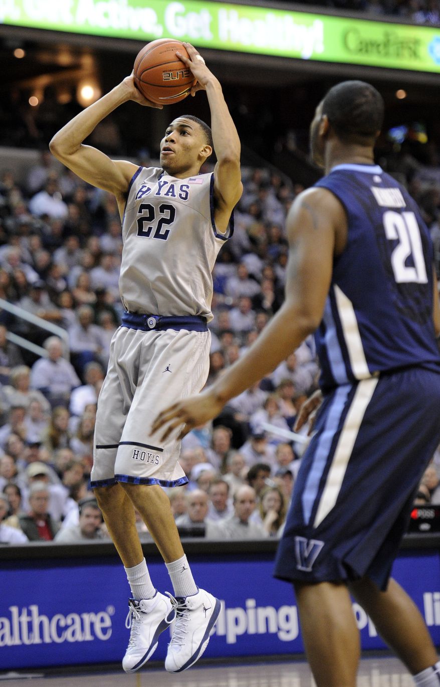 Georgetown forward Otto Porter takes a shot against Villanova forward Markus Kennedy during the second half Saturday, Feb. 25, 2012, in Washington. Georgetown won 67-46. (AP Photo/Nick Wass)