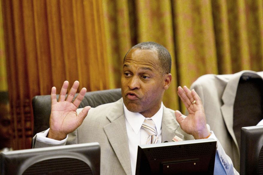 Harry Thomas, Jr., Ward 5 Councilmember, gestures during a legislative session at the John A. Wilson Building, in Washington, D.C., Tuesday, July 12, 2011. (Drew Angerer/The Washington Times)