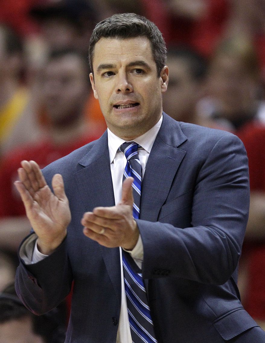 Virginia head coach Tony Bennett reacts after a play against Maryland in the second half in College Park, Md., Sunday, March 4, 2012. Virginia won 75-72 in overtime. (AP Photo/Patrick Semansky)