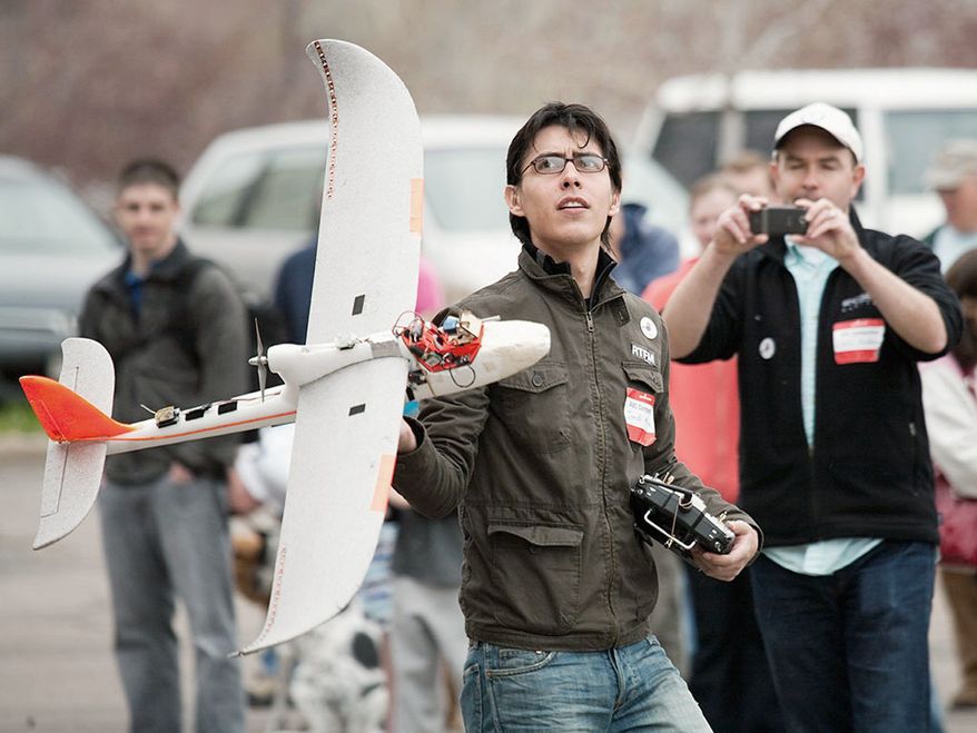 Jordi Munoz holds drone he made himself. (Courtesy of Jordi Munoz)