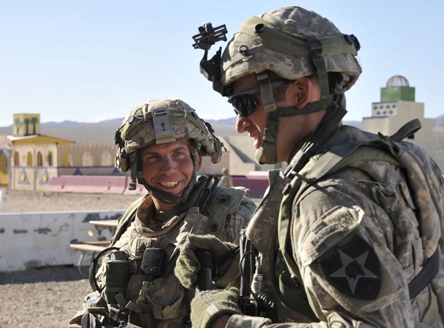 In this Aug. 23, 2011, Defense Video & Imagery Distribution System photo, soldiers from Blackhorse Company, 2nd Battalion, 3rd Infantry Regiment, 3rd Stryker Brigade Combat Team, 2nd Infantry Division, including Staff Sgt. Robert Bales, left, take part in exercise at the National Training Center at Fort Irwin, Calif. Five days after an attack on Afghan villagers killed 16 civilians, a senior U.S. official identified Bales as the suspect in that attack. (AP Photo/DVIDS, Spc. Ryan Hallock)