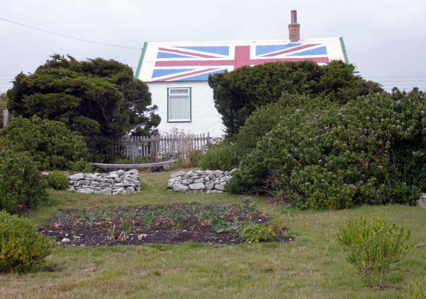 **FILE** Loyalty to Britain is displayed on the home of the mother of Jan Cheek, one of the eight members of the Falkland Islands Legislative Assembly, in this March 13, 2012, file photo. (Associated Press)