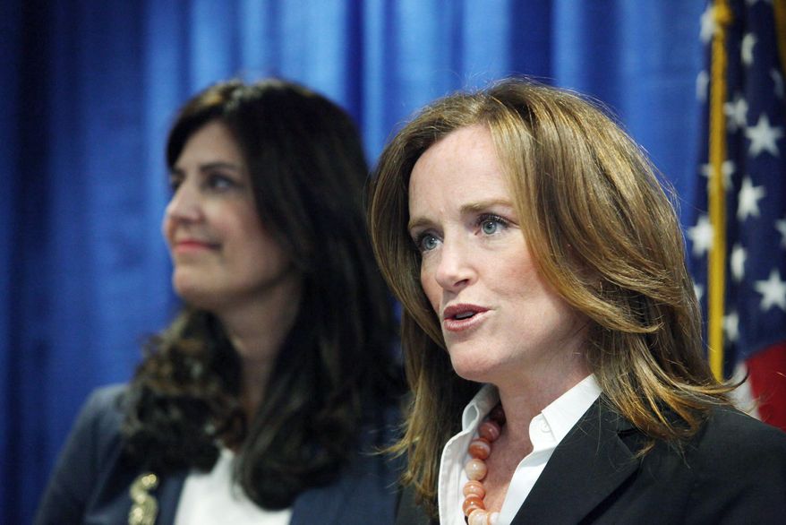 Nassau County District Attorney Kathleen Rice (right) joins Kathryn Juric, vice president of the SAT program for the College Board, in Mineola, N.Y., on Tuesday as they announce a security overhaul to prevent cheating on the SAT exams.