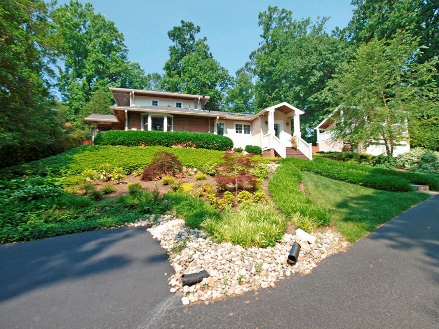 The home at 511 Stonington Road in Silver Spring has been transformed over the years from a modest rambler into a sprawling Arts and Crafts-style home. It is on the market for $1,275,000.