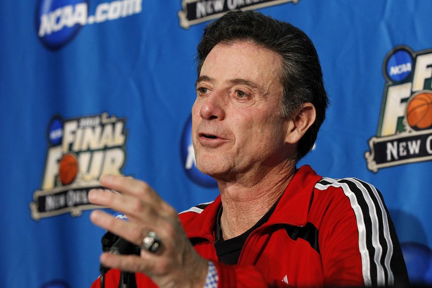 Louisville head coach Rick Pitino talks to reporters during a news conference in New Orleans on Thursday, March 29, 2012. Louisville will play Kentucky in an NCAA tournament Final Four game on Saturday. (AP Photo/Gerald Herbert)