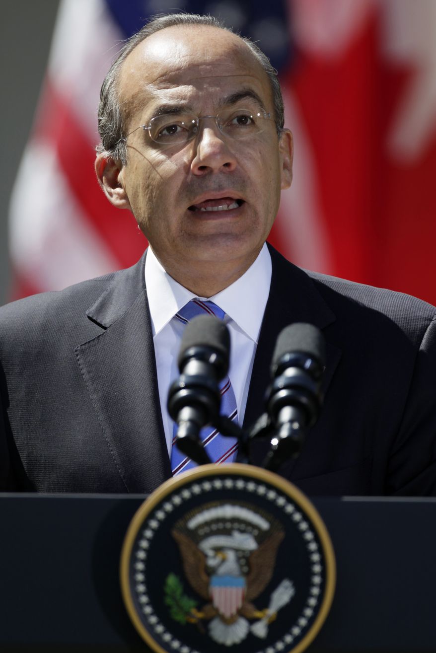 Mexican President Felipe Calderon speaks April 2, 2102, during a joint news conference with President Obama and Canadian Prime Minister Stephen Harper in the Rose Garden of the White House. (Associated Press)
