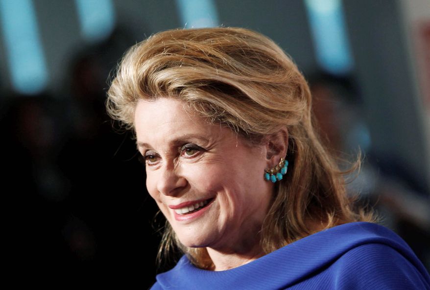 French actress Catherine Deneuve arrives for the Film Society of Lincoln Center's 39th annual Chaplin Award Gala at Alice Tully Hall, Monday, April 2, 2012 in New York. (AP Photo/Jason DeCrow)