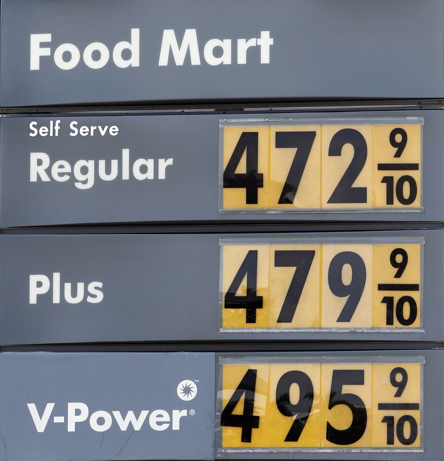 Gasoline prices are shown at a local gas station in Miami, Wednesday, April 4, 2012. (AP Photo/Alan Diaz)
