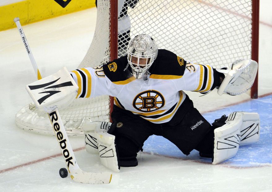 Boston goalie Tim Thomas, the MVP if last year's playoffs, will backstop the Bruins as they begin defense of their championship Thursday against Washington. (AP Photo/Lori Shepler)