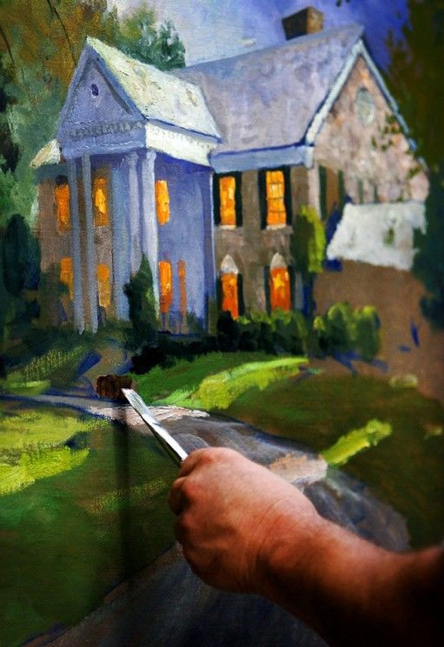 Thomas Kinkade works on a study of Elvis Presley's Graceland in Memphis, Tenn., in September 2006. Hand-signed limited-edition reproductions of his work sell for $8,000 to $15,000. (Associated Press)