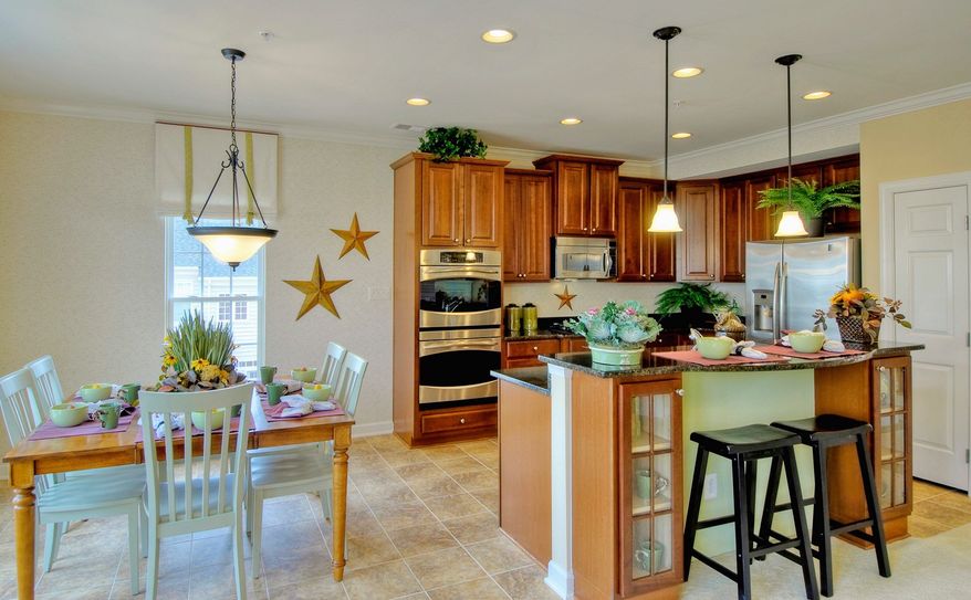 Both models at Linton at Bellenger Crossing feature 42-inch oak cabinets and a pantry in the kitchen.