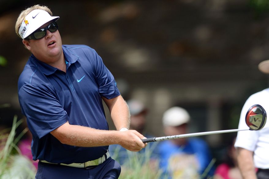 Carl Pettersson watches his drive on the first hole during the third round of the RBC Heritage tournament in Hilton Head Island, S.C., on Saturday, April 14, 2012. (AP Photo/The Island Packet, Jonathan Dyer)