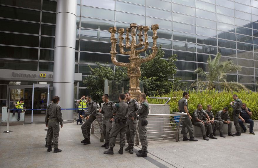 ** FILE ** Israeli police officers are deployed at the Ben Gurion Airport near Tel Aviv on Sunday, April 15, 2012, to detain activists flying in to protest the country's occupation of Palestinian areas. (AP Photo/Dan Balilty)