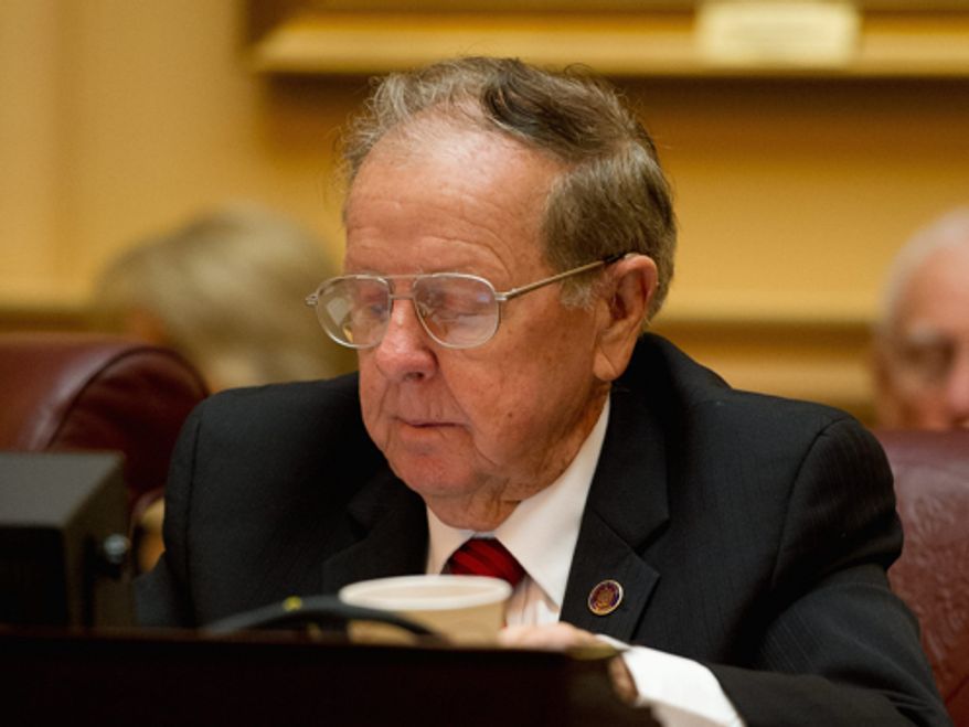 Sen. Charles J. Colgan, Prince William Democrat and a budget conferee, signed the conference report but has not said whether he will vote for the bill on the floor Tuesday. (Andrew Harnik/The Washington Times)