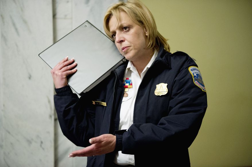 Chief Cathy L. Lanier's contract expired in April, and negotiations on a new be affected by a new law capping executive salaries. Her current $253,000 salary is fourth-highest in the nation. (Andrew Harnik/The Washington Times)
