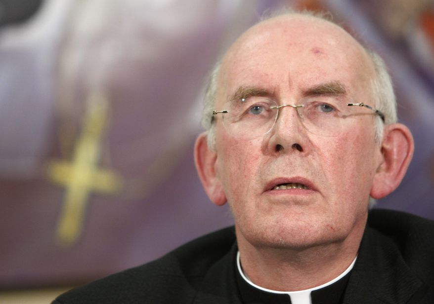 Irish Cardinal Sean Brady listens to reporters' questions at the end of a press conference at the offices of Vatican Radio on Tuesday, Feb. 16, 2010, in Rome. (AP Photo/Alessandra Tarantino)