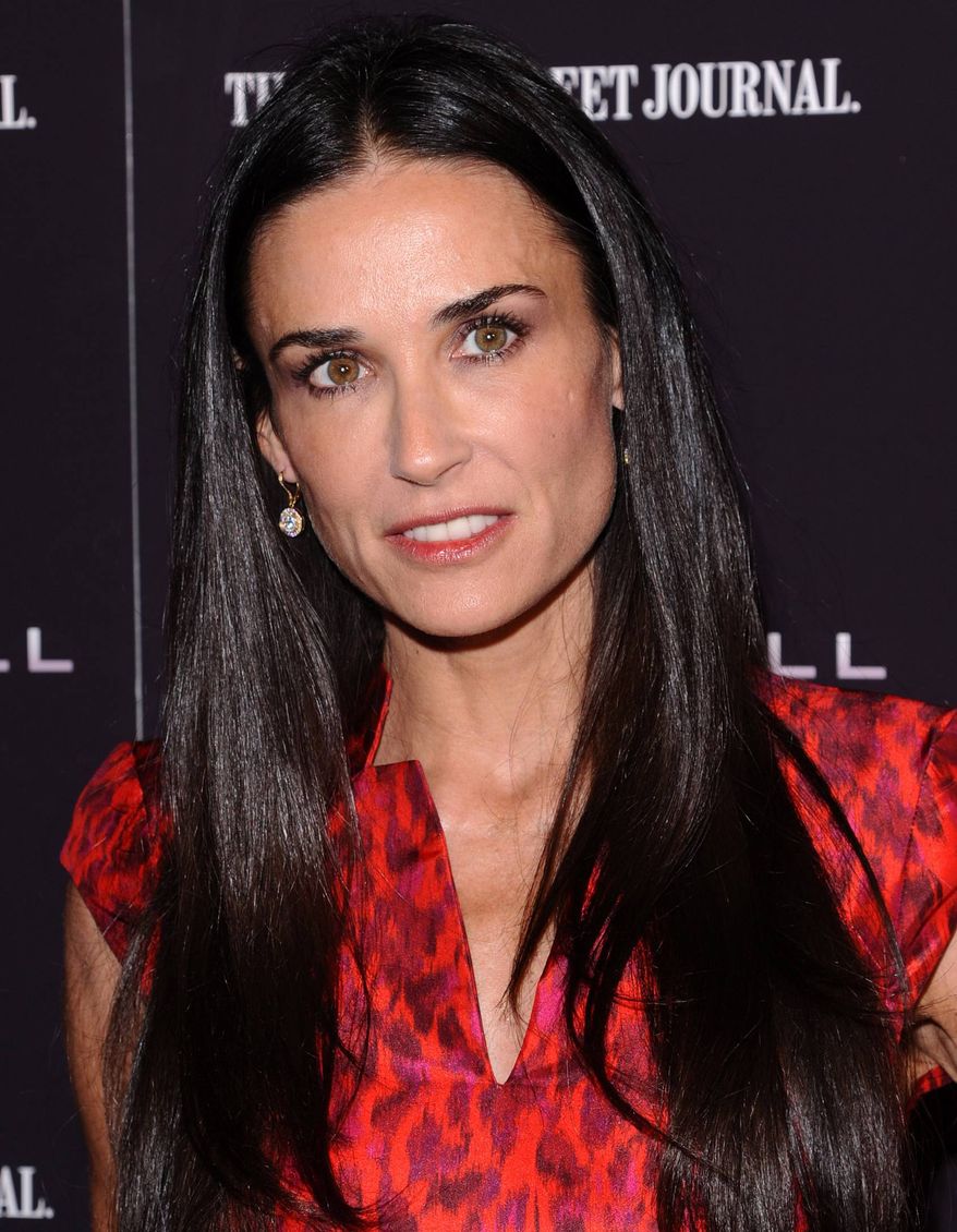 ** FILE ** In this Oct. 17, 2011, file photo, actress Demi Moore attends the premiere of "Margin Call" in New York. The 49-year old actress changed her Twitter name to @justdemi on Thursday, May 3, 2012. (AP Photo/Peter Kramer, File)