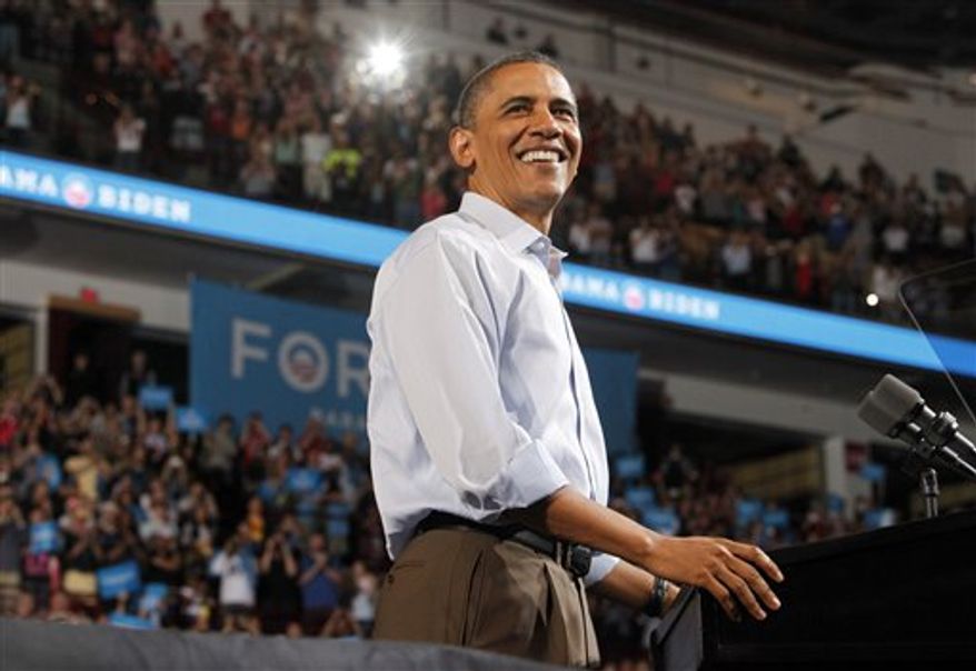 President Barack Obama speaks during a campaign rally at the Value City Arena in Columbus, Ohio on Saturday, May 5, 2012. (AP Photo/Columbus Dispatch, Brooke LaValley)