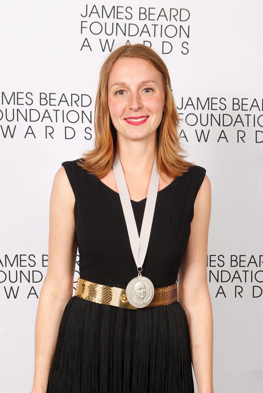Christina Tosi, of Momofuku Milk Bar in New York, poses with her Rising Star Chef of the Year medal during the James Beard Foundation Awards, Monday, May 7, 2012, in New York. (AP Photo/Jason DeCrow)