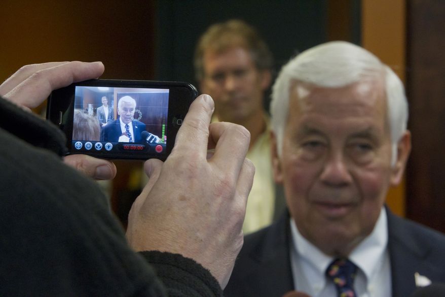 Sen. Richard G. Lugar, Indiana Republican, is video-recorded by cellphone on Monday, May 7, 2012, during a visit to a waste-water treatment center in West Lafayette, Ind. (Associated Press/Journal & Courier)