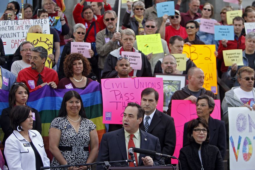 Openly gay Colorado state Sen. Pat Steadman (center) speaks at a rally in support of civil unions at the Capitol in Denver on Tuesday, May 8, 2012. (AP Photo/Ed Andrieski)
