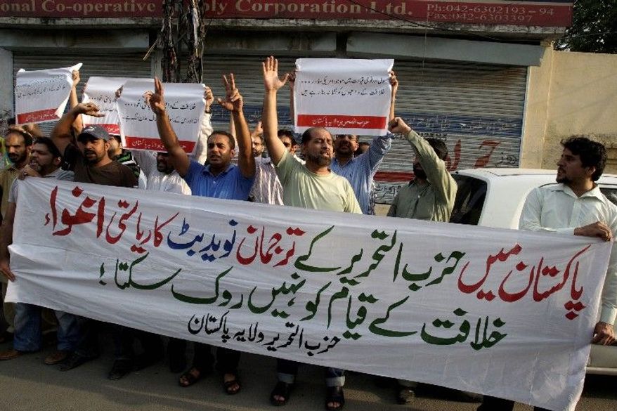 Pakistani supporters of the banned Islamist organization Hizb ut-Tahrir chant slogans and hold a banner that reads, "the state-sponsored abduction of Hizb ut-Tahrir spokesman Naveed Butt cannot stop the emergence of caliphate," during a protest in Lahore. A Pakistani army general accused of plotting with the Islamist organization to attack military headquarters has written a manifesto from his prison cell. It calls on the army to sever its anti-terror alliance with the United States, which he says is forcing the country to fight its own people. (Associated Press)