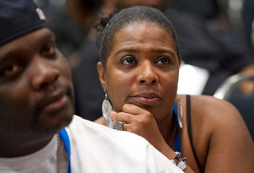 Veleta Terry listens to performances and tributes during the memorial service for D.C. Go Go icon Chuck Brown Thursday, May 31, 2012 at the Washington Convention Center in Washington, D.C. (Barbara L. Salisbury/The Washington Times)