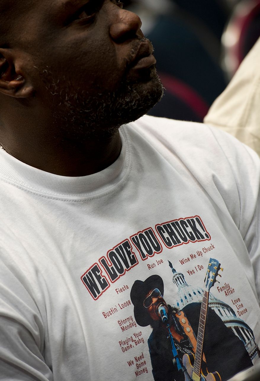 A man wears a "We Love You Chuck!" shirt at the memorial service for D.C. Go Go icon Chuck Brown Thursday, May 31, 2012 at the Washington Convention Center in Washington, D.C. (Barbara L. Salisbury/The Washington Times)