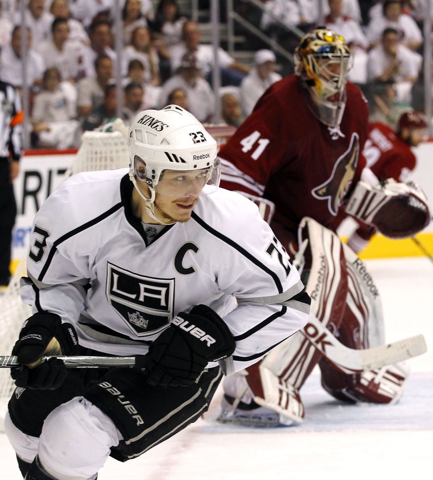 Captain Dustin Brown is looking to lead the eighth-seeded Los Angeles Kings to the Stanley Cup. If he does it, he would become the second American-born captain to do so. Brown was born in Ithaca, N.Y. (AP Photo/Ross D. Franklin, File)