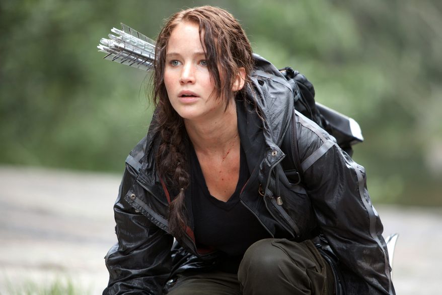 Jennifer Lawrence on Sunday won the MTV Movie Award for best female performance for her role in "The Hunger Games." The dystopian survival saga notched four wins out of eight nominations. (Lionsgate via Associated Press)