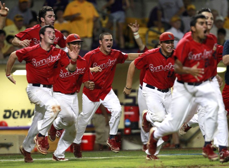 Stony Brook celebrates after defeating LSU 7-2 in Game 3 of an NCAA college baseball tournament super regional game in Baton Rouge, La., Sunday, June 10, 2012. Stony Brook advances to the College World Series. (AP Photo/Gerald Herbert)
