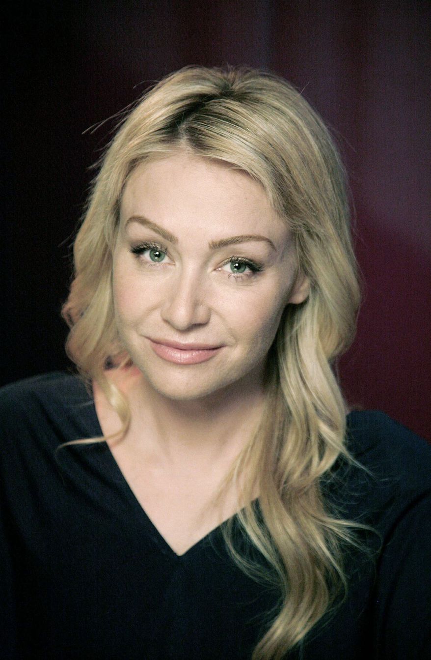 Actress Portia de Rossi poses for a portrait Wednesday, Nov. 3, 2010 in New York. (AP Photo/Jeff Christensen)