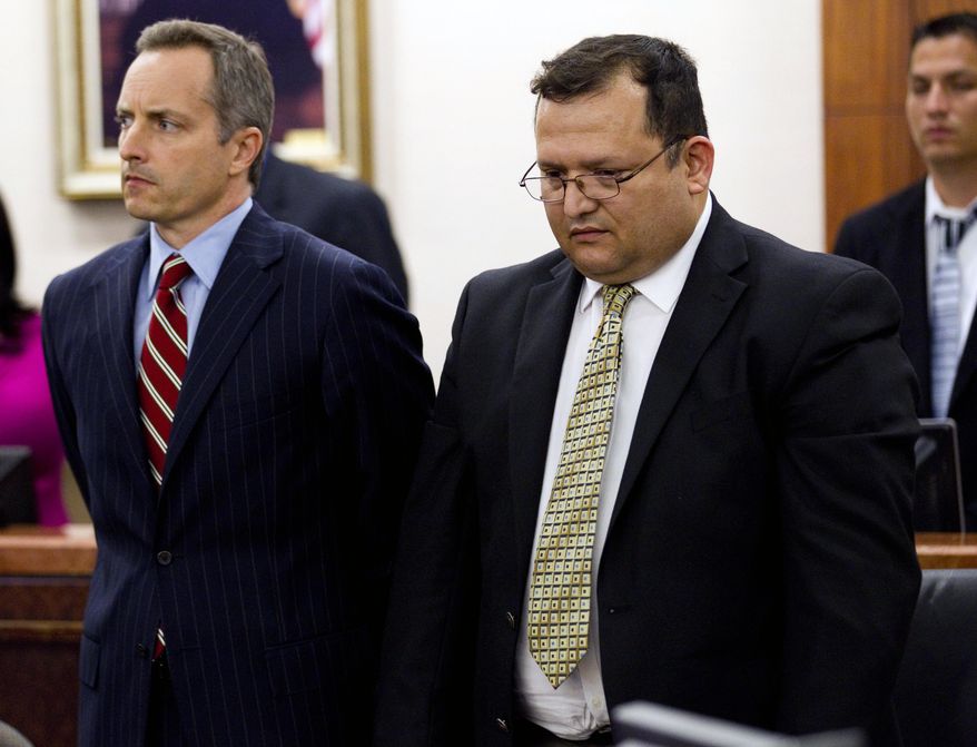 Raul Rodriguez (right) stands with his attorney Bill Stradley in a Houston courtroom on Wednesday, June 13, 2012, as he is found guilty of killing a neighbor two years ago. (AP Photo/Houston Chronicle, Brett Coomer)
