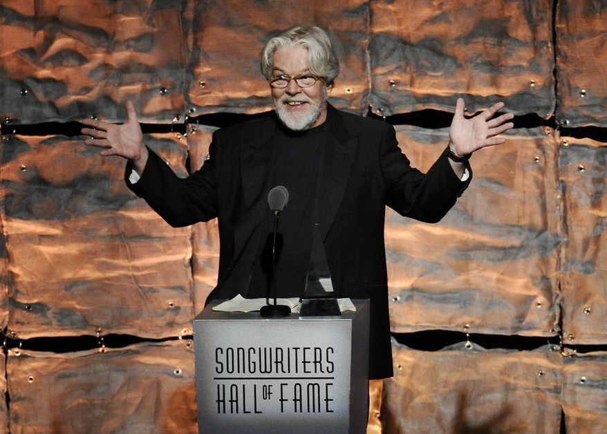 Bob Seger was inducted into the Songwriters Hall of Fame on Thursday, opening the ceremony with a spirited version of his 1973 classic, "Turn the Page." (Invision)