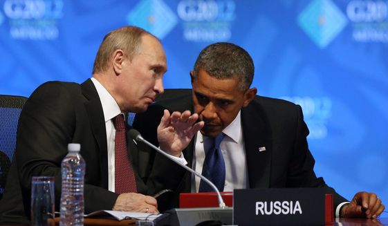 President Obama listens June 18, 2012, to Russian President Vladimir Putin before the opening of the first plenary session of the G-20 Summit in Los Cabos, Mexico. (Associated Press)