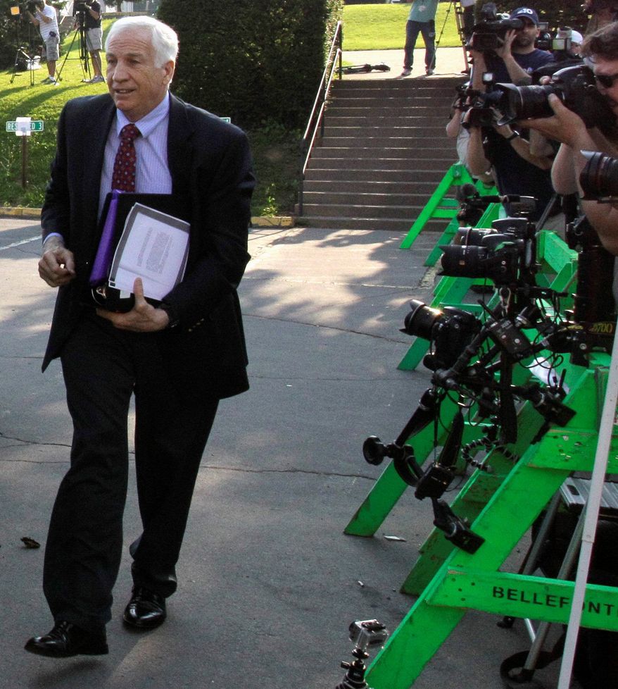 Former Penn State University assistant football coach Jerry Sandusky arrives at the Centre County Courthouse in Bellefonte, Pa., on Wednesday. (Associated Press)