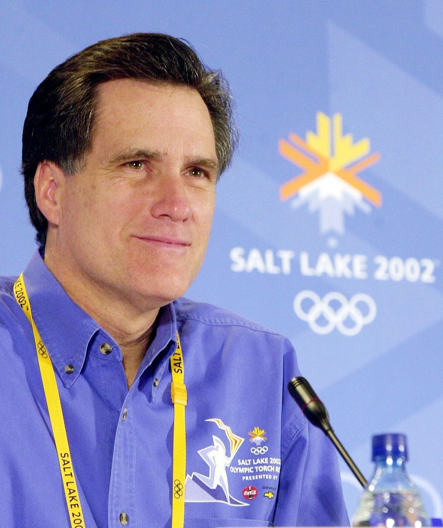 Mitt Romney, seen here in February 2002 as president of the Salt Lake Organizing Committee, will attend this year's London Olympics. (Associated Press)
