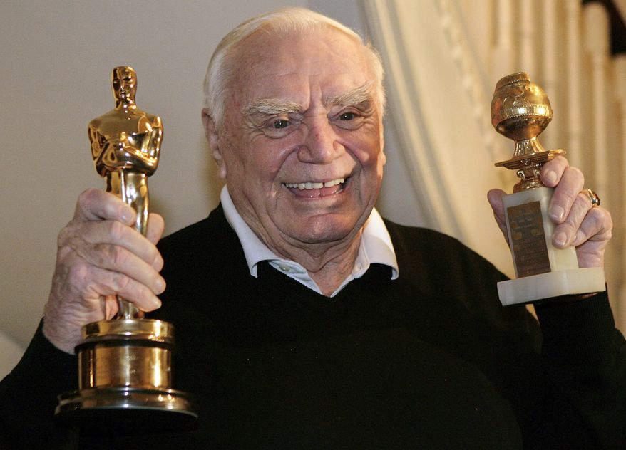 **FILE** Actor Ernest Borgnine displays his Golden Globe (right) and Academy awards he received in 1956 for the movie "Marty" in Beverly Hills, Calif., on Jan. 13, 2008. (Associated Press