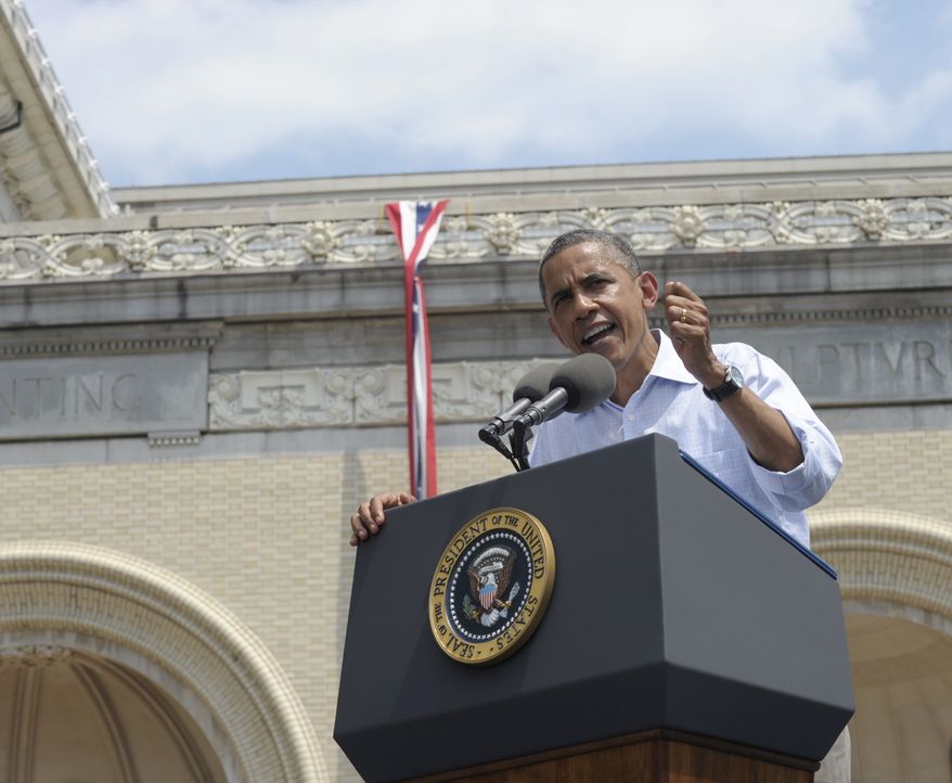 President Obama speaks at Carnegie Mellon University in Pittsburgh on Friday, July 6, 2012, while on a two-day campaign swing by bus through Ohio and Pennsylvania. The presidential seal adorns the lectern. (AP Photo/Susan Walsh)