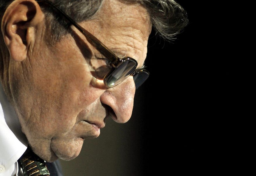 ** FILE ** In this Sept. 30, 2008, file photo, Penn State football coach Joe Paterno listens to a question during his weekly news conference in State College, Pa. (AP Photo/Pat Little)